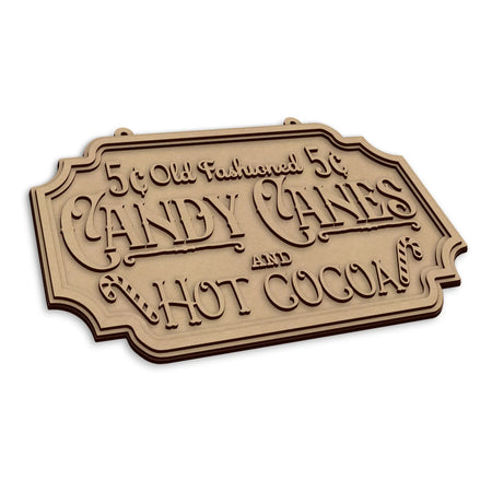 A wooden christmas sign with a vintage candy cane and hot cocoa theme.