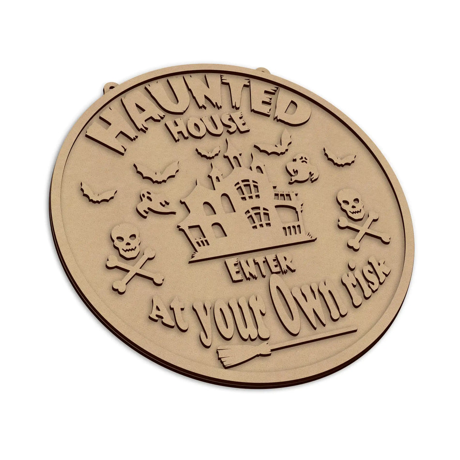 A laser cut Enter At Your Own Risk Halloween Plaque, ready to be decorated for the spooky season.