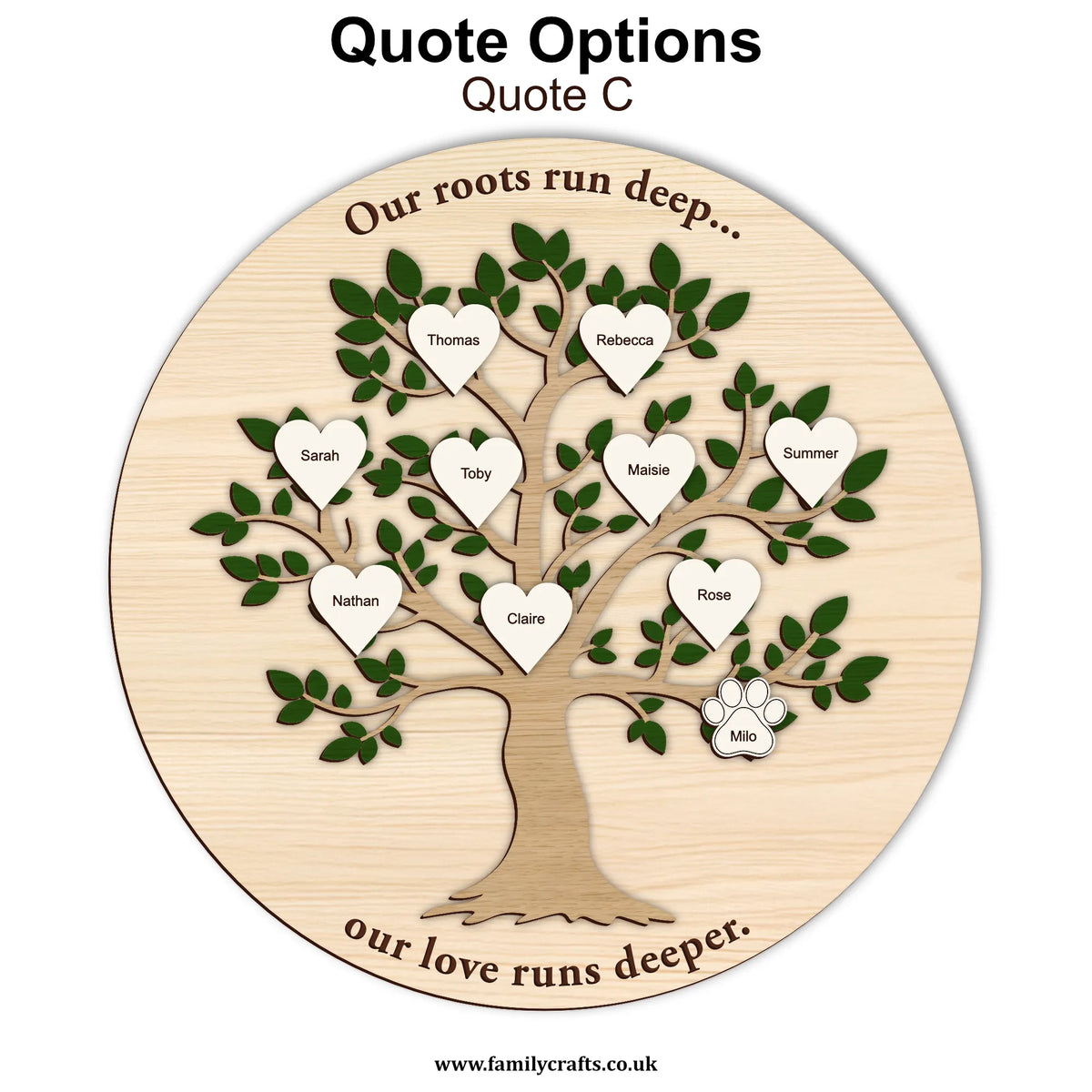 Wooden family tree with engraved names and 'Our roots run deep' quote on a white background.