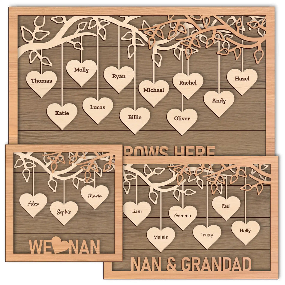 Wooden family tree with hanging hearts and engraved names.
