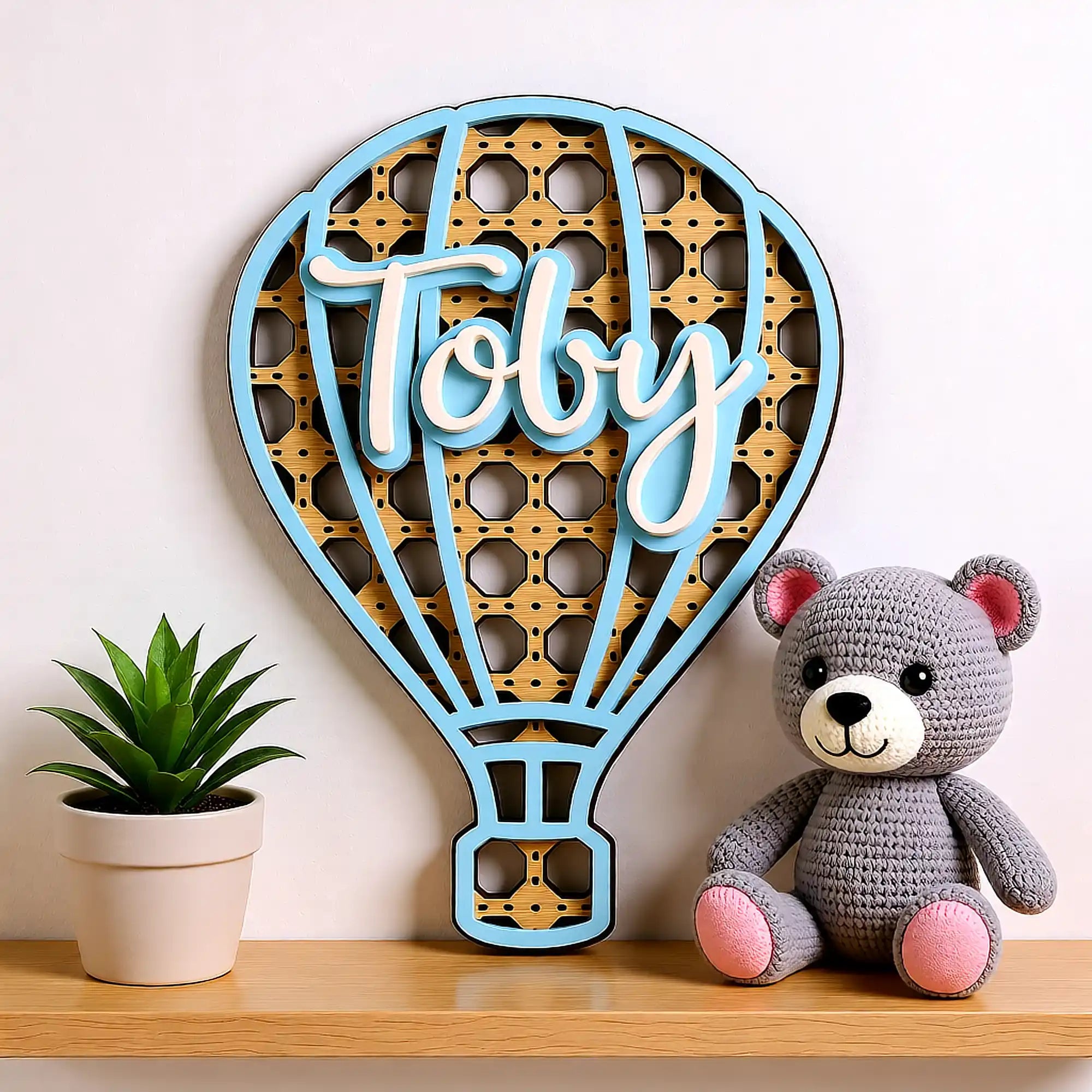 Rattan hot air balloon name plaque for nursery setting