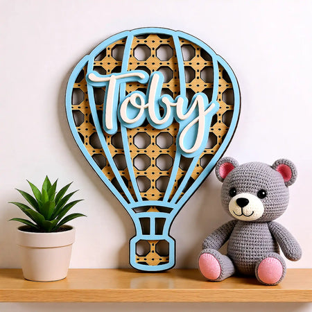 Rattan hot air balloon name plaque for nursery setting