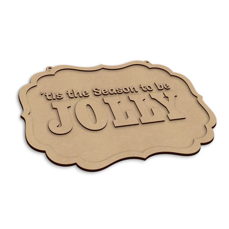 A laser-cut wooden sign with the phrase 'It's the Season to be JOLLY' in raised letters, shown on a plain white background.